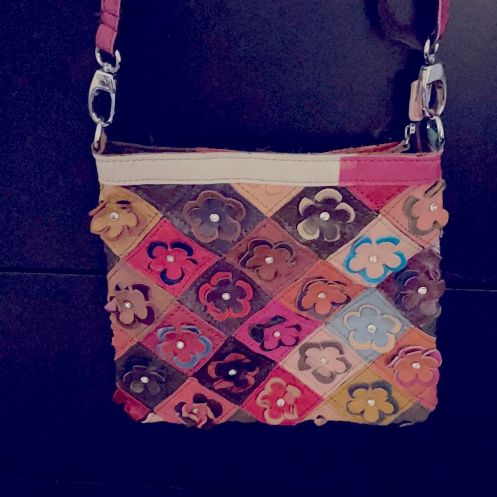 Multi dimensional multi colored cross body bag